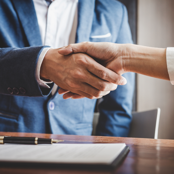 close up of shaking hands