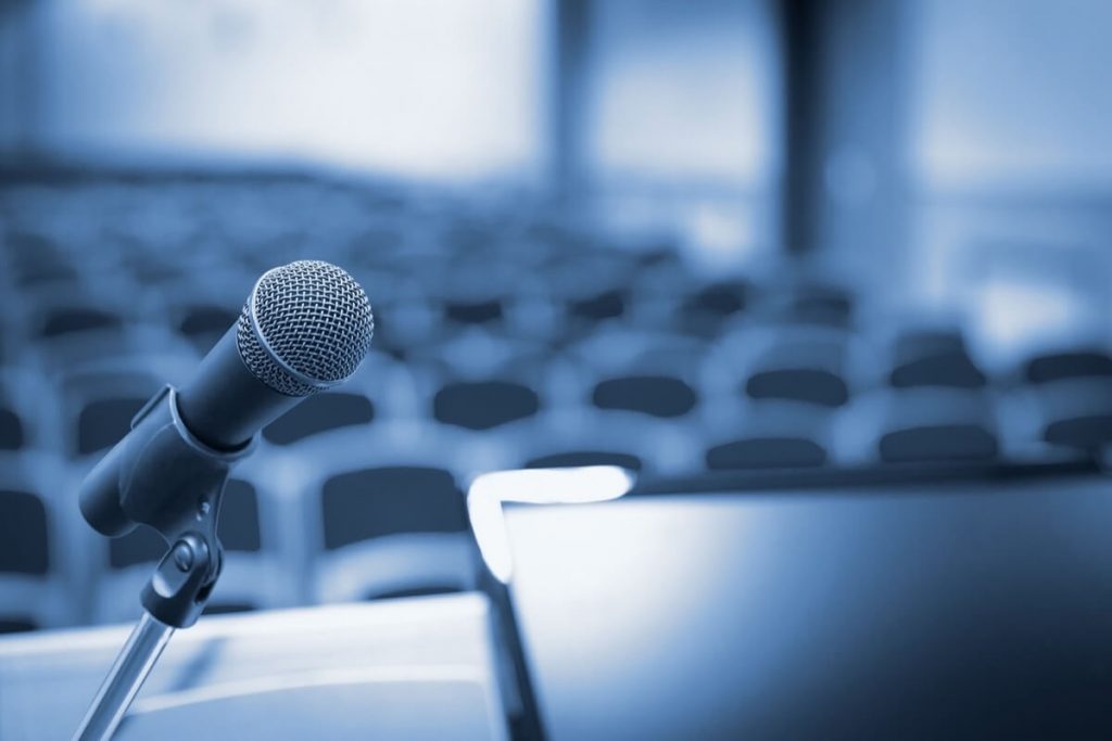 microphone at podium in auditorium.